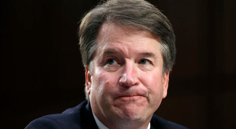 In this Sept. 6, 2018 photo, Supreme Court nominee Brett Kavanaugh reacts as he testifies after questioning before the Senate Judiciary Committee on Capitol Hill in Washington. Brett Kavanaugh