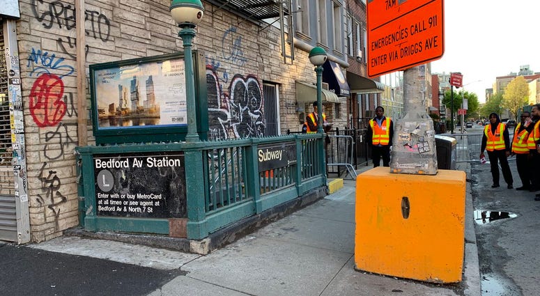 MTA workers at the Bedford Avenue station in Williamsburg. L train Bedford Avenue