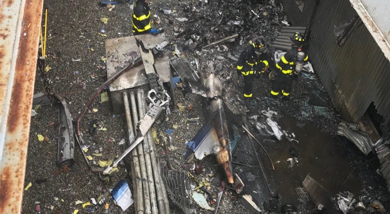 FDNY firefighters on the scene of a helicopter crash in Midtown Manhattan Midtown Helicopter Crash