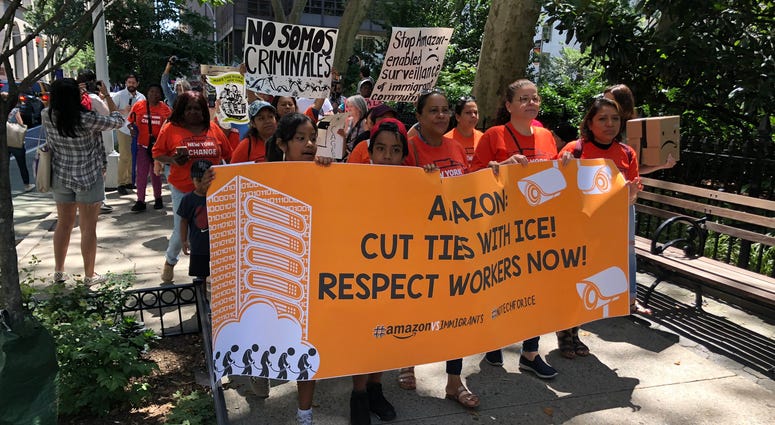 Protesters demand Amazon stop working with ICE Amazon Protest