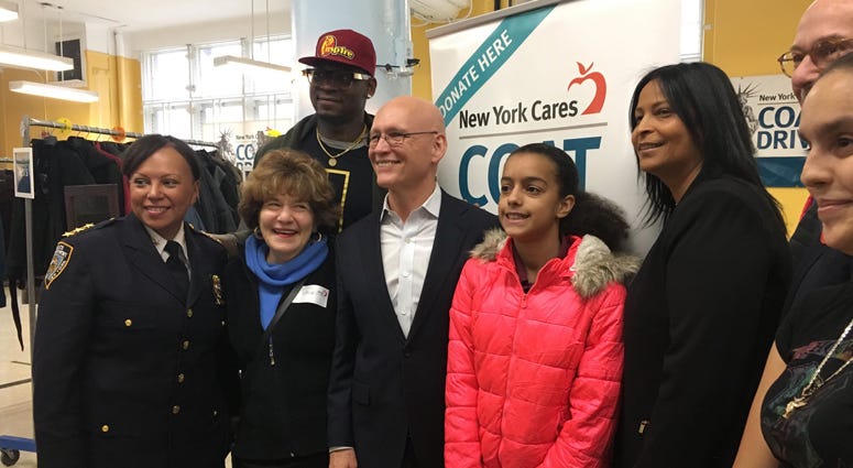13-year-old Marilyn received the 2 millionth coat donated to New York Cares New York Cares Coat Drive