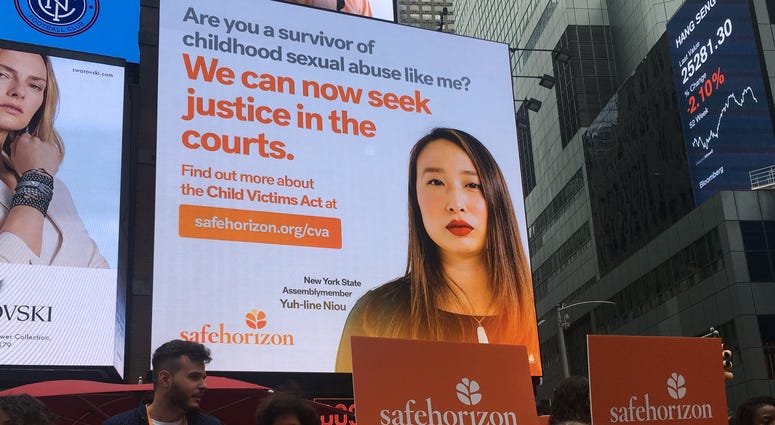 A billboard in Times Square encourages victims of child sexual abuse to file lawsuits as the Child Victims Act takes effect. Child Sex Abuse Billboard