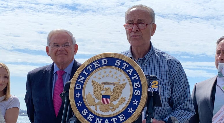 Sens. Chuck Schumer and Bob Menendez at a press conference about FlyNyon flights. Chuck Schumer and Bob Menendez
