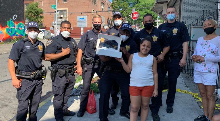 The 10-year-old received a birthday cake from NYPD officers. Girl gets birthday cake from NYPD