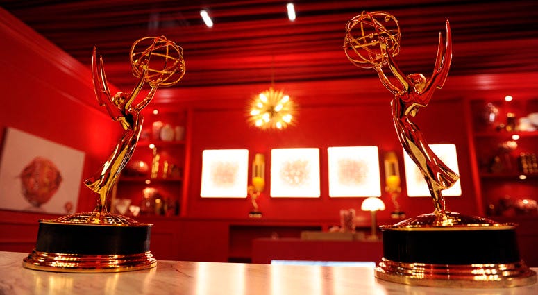 In this Sept. 13, 2018 file photo, Emmy Award statuettes are displayed inside the Lindt Chocolate Lounge inside the Microsoft Theatre in Los Angeles. Emmy Awards