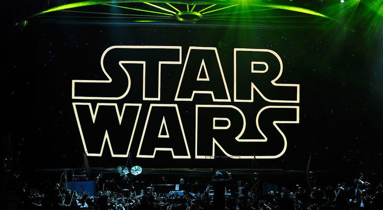 The opening title from the Star Wars film series is shown on screen while musicians perform during 'Star Wars: In Concert' at the Orleans Arena May 29, 2010 in Las Vegas, Nevada. Star Wars
