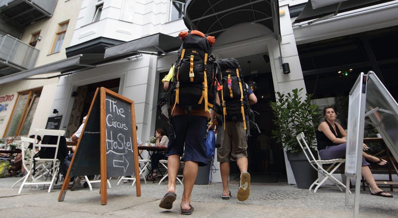 Backpackers arrive at the Circus hostel Berlin on July 19, 2010 in Berlin, Germany. Circus hostel