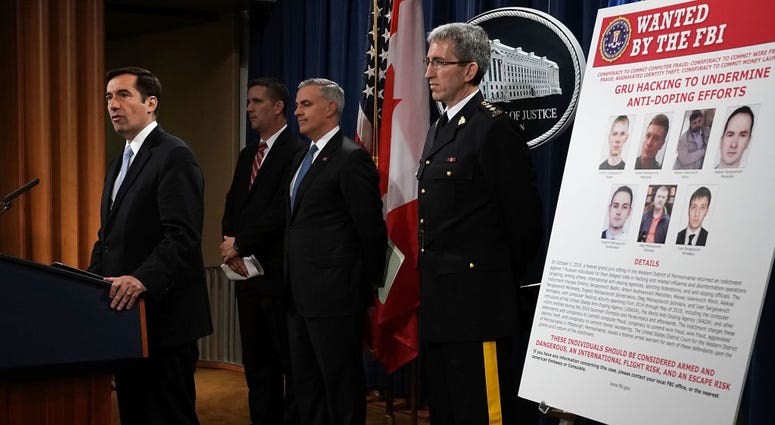 Officials announce criminal charges against seven Russian military intelligence officers. Russian hack charges