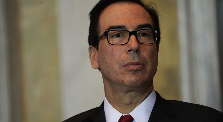 U.S. Secretary of the Treasury Steven Mnuchin listens during a Financial Stability Oversight Council meeting October 16, 2018 at the Treasury Department in Washington, DC. Steven Mnuchin