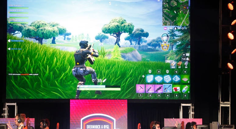 Students from Louisiana State University and The University of Washington compete in the online game Fortnite during DreamHack Atlanta 2018 at the Georgia World Congress Center on November 16, 2018 in Atlanta, Georgia. Fortnite