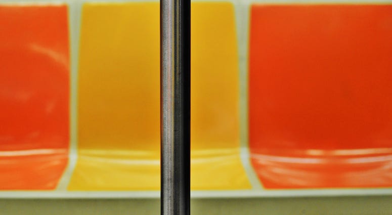 Interior view of a New York City subway car. Subway Seats
