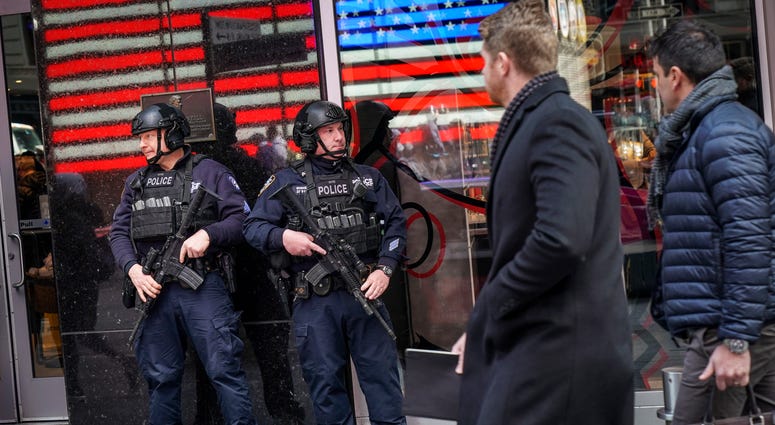 NYPD members patrol Times Square. NYPD Times Square