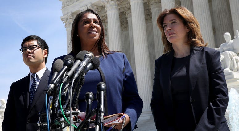 New York Attorney General Letitia James (C), New York Census Director Julie Menin (R) and ACLU's Director of the Voting Project Dale Ho (L) answer questions outside the U.S. Supreme Court on April 23, 2019. Letitia James