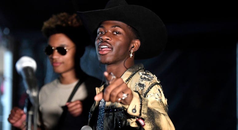 YoungKio (L) and Lil Nas X backstage during the 2019 Stagecoach Festival at Empire Polo Field on April 28, 2019 in Indio, California. Lil Nas x