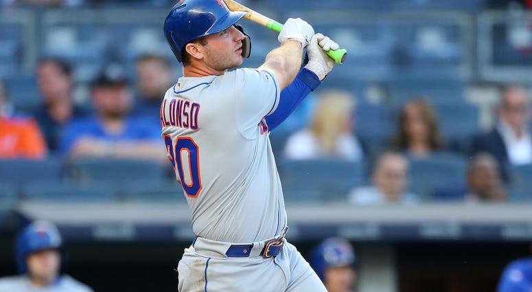 Pete Alonso #20 of the New York Mets hits a three-run home run to left center field in the first inning against the New York Yankees at Yankee Stadium on June 11, 2019 in New York City. Pete Alonso #20 of the New York Mets hits a three-run home run to left center field in the first inning against the New York Yankees at Yankee Stadium on June 11, 2019 in New York City.