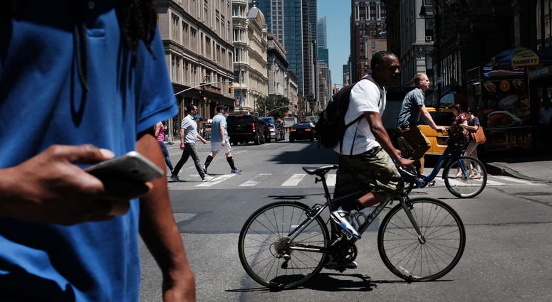 Bicyclists and pedestrians in New York City. Bicyclists and pedestrians in New York City