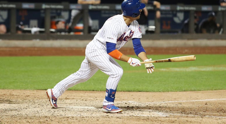 Michael Conforto #30 of the New York Mets drives in two runs in the eighth inning with a double against the New York Yankees during their game at Citi Field on July 02, 2019 Michael Conforto #30 of the New York Mets drives in two runs in the eighth inning with a double against the New York Yankees during their game at Citi Field on July 02, 2019