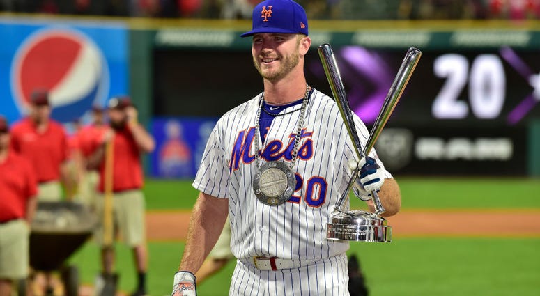 Pete Alonso of the New York Mets celebrates winning the T-Mobile Home Run Derby at Progressive Field on July 08, 2019 Pete Alonso of the New York Mets celebrates winning the T-Mobile Home Run Derby at Progressive Field on July 08, 2019