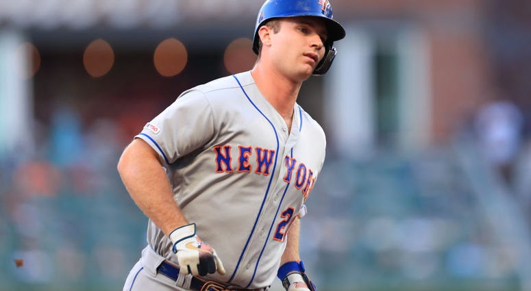 Pete Alonso #20 of the New York Mets rounds third after hitting a three run home run in the first inning during the game against the Atlanta Braves at SunTrust Park on August 15, 2019 Pete Alonso #20 of the New York Mets rounds third after hitting a three run home run in the first inning during the game against the Atlanta Braves at SunTrust Park on August 15, 2019