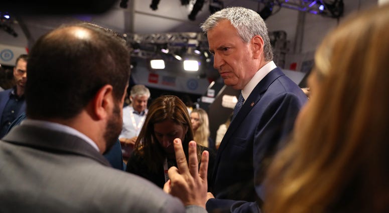 Democratic presidential candidate New York City Mayor Bill De Blasio speaks to the media in the spin room after the Democratic Presidential Debate at the Fox Theatre July 31, 2019 in Detroit, Michigan. Bill de Blasio