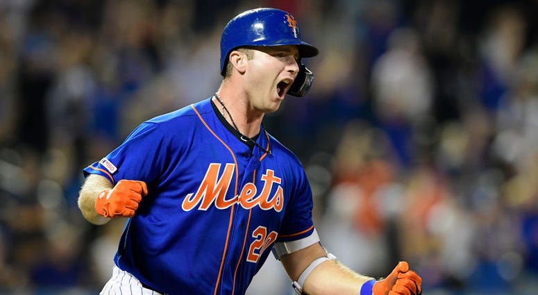 Pete Alonso #20 of the New York Mets celebrates his seventh inning game-winning home run against the Miami Marlins at Citi Field on August 05, 2019 in New York City. Pete Alonso #20 of the New York Mets celebrates his seventh inning game-winning home run against the Miami Marlins at Citi Field on August 05, 2019 in New York City.
