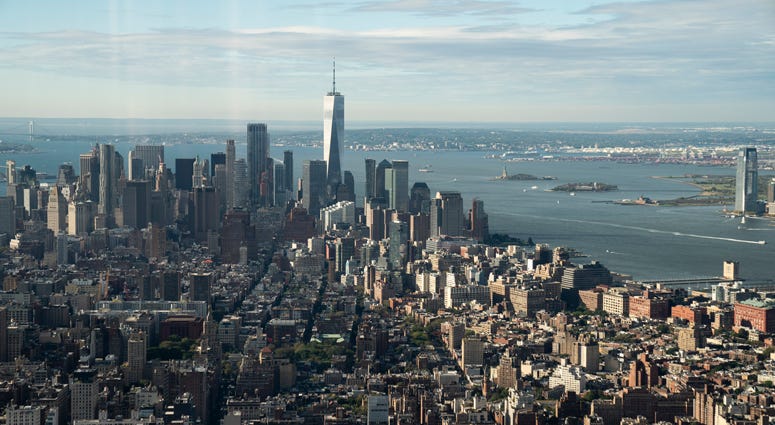 A view of Lower Manhattan from inside the newly renovated 102nd floor observatory of the Empire State Building on October 10, 2019. Empire State Building Observatory