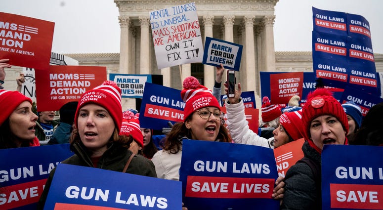 Gun safety advocates rally in front of the U.S. Supreme Court before during oral arguments in the Second Amendment case NY State Rifle & Pistol v. City of New York, NY on December 2, 2019 in Washington, DC. SCOTUS Gun Protest