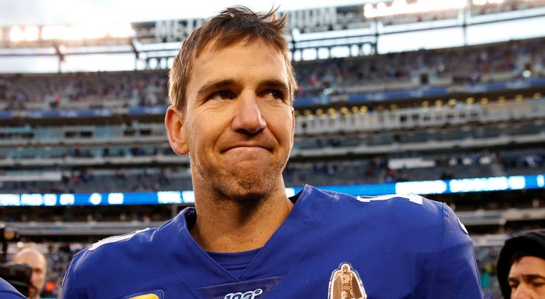 Eli Manning #10 of the New York Giants walks on the field after the game against the Miami Dolphins at MetLife Stadium on December 15, 2019 in East Rutherford, New Jersey. Eli Manning
