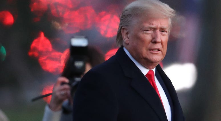 U.S. President Donald Trump walks toward Marine One prior to his departure for a campaign event in Battle Creek, Michigan, December 18, 2019 at the White House in Washington, DC. Donald Trump