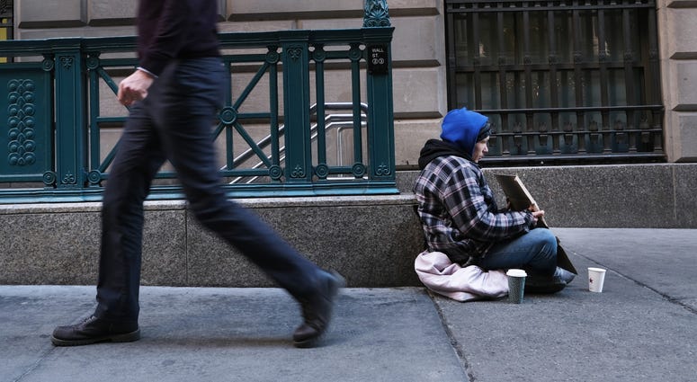 A homeless person on the street in New York. A homeless person on the street in New York