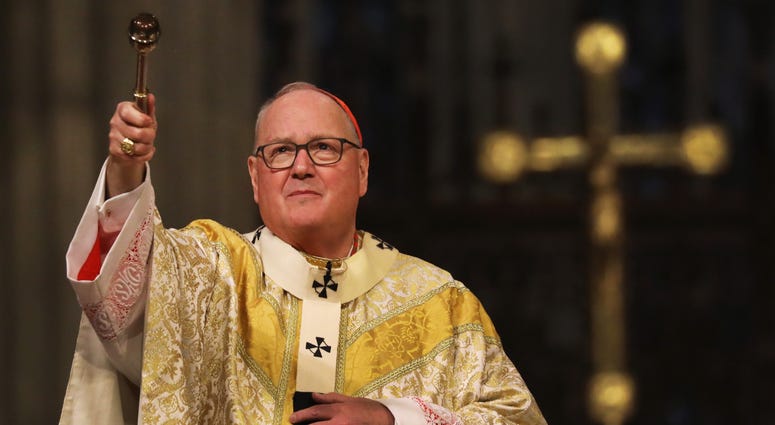 Cardinal Timothy Dolan, the Archbishop of New York, celebrates Easter Sunday Mass in a nearly empty St. Patrick’s Cathedral as the coronavirus outbreak has kept most churches empty this Easter on April 12, 2020 in New York City. Cardinal Timothy Dolan