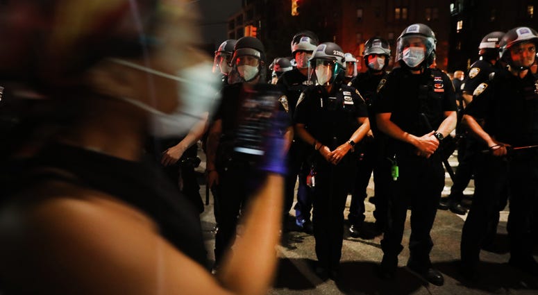Police confront protesters as demonstrations continue in Brooklyn on May 29, 2020 in New York City. NYC protest