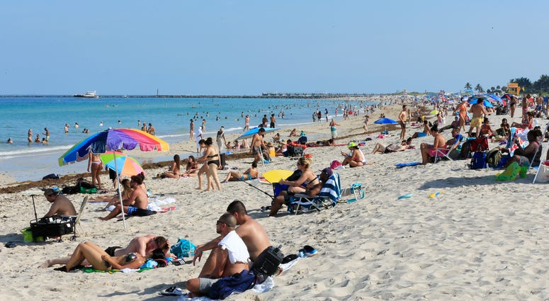 Beachgoers take advantage of the opening of South Beach on June 10, 2020 in Miami Beach, Florida. Coronavirus Florida