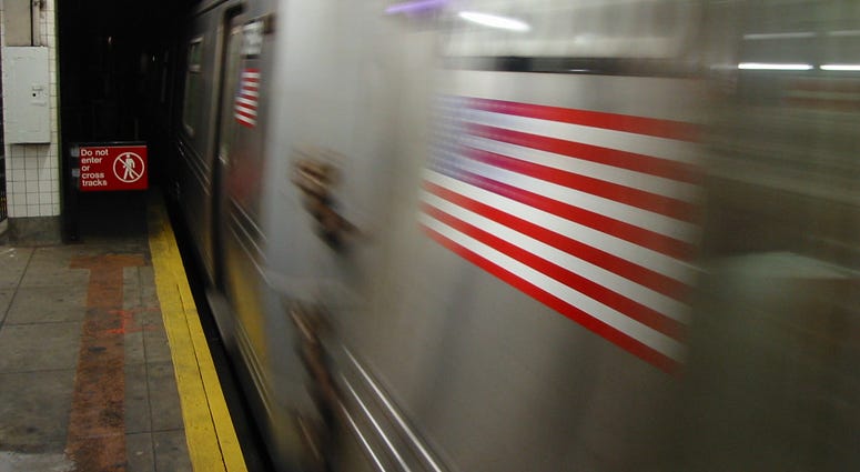 New York subway approaching a station with motion blur. Blurred Subway Train
