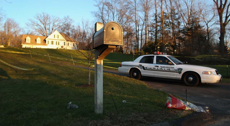 Police guard the entrance of the Lanza residence on December 19, 2012 in Newtown, Connecticut. Adam Lanza House