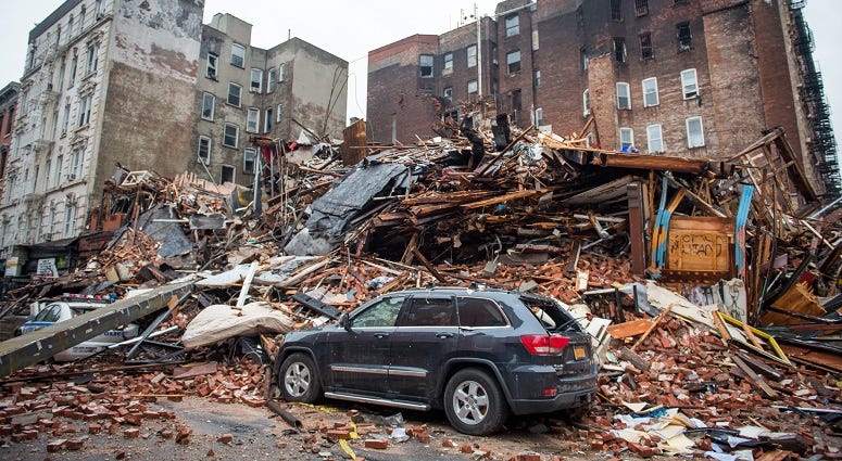 A debris-strewn street seen amid the site of a seven-alarm fire that caused the collapse of two buildings and damage to two other buildings a day after the blaze took place on March 27, 2015 in New York City. 2015 East Village Explosion