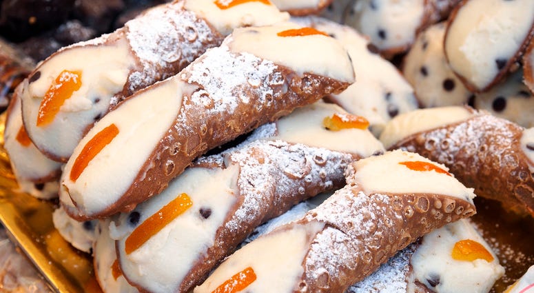 Traditional and famous Sicilian cannoli, cream horns, with fresh cream and cedro. Cannoli