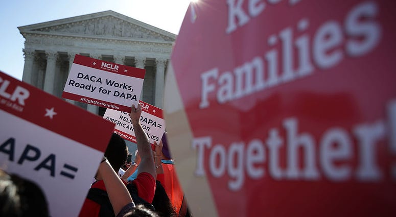 Pro-immigration activists gather in front of the U.S. Supreme Court on April 18, 2016 in Washington, DC. DACA