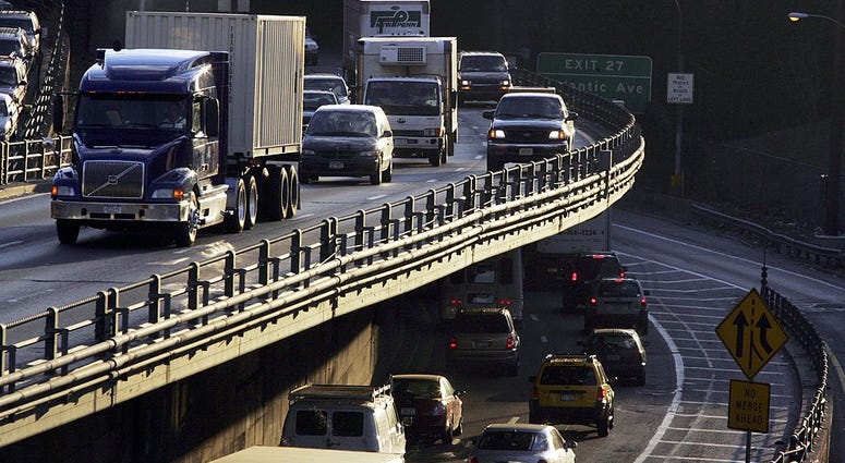 Traffic moves on the Brooklyn Queens Expressway near the enterance to the Brooklyn Bridge on March 23, 2006 in the Brooklyn borough of New York City. BQE