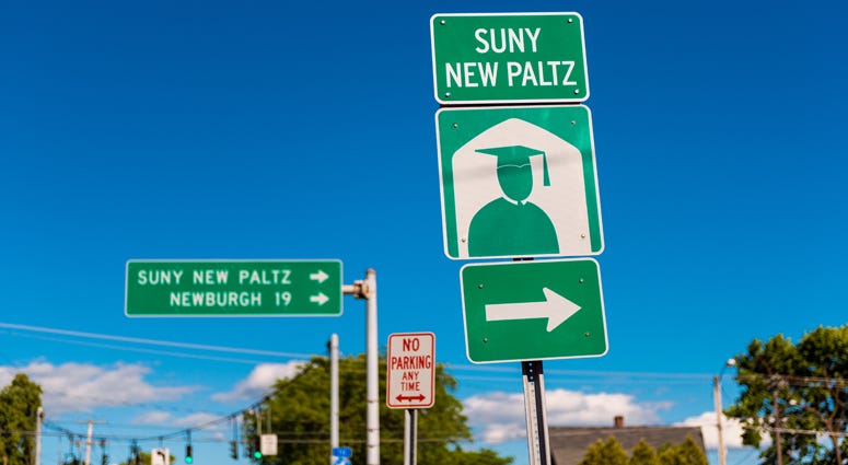 Directional Sign to SUNY New Paltz, a public college with about 7,500 attending students in New Paltz, upstate New York, USA. SUNY New Paltz