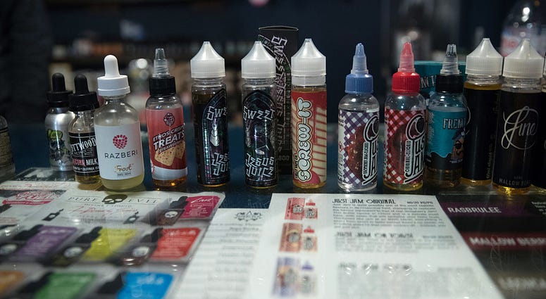 E-cigarette merchandise is displayed for sale at the Vapour Place a vaping shop in Bedminster, on December 30, 2016 in Bristol, England. Vape Juice