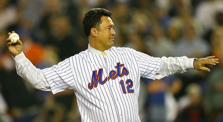 Ron Darling formerly of the New York Mets throws out the first pitch of game seven of the NLCS against the St. Louis Cardinals at Shea Stadium on October 19, 2006 Ron Darling