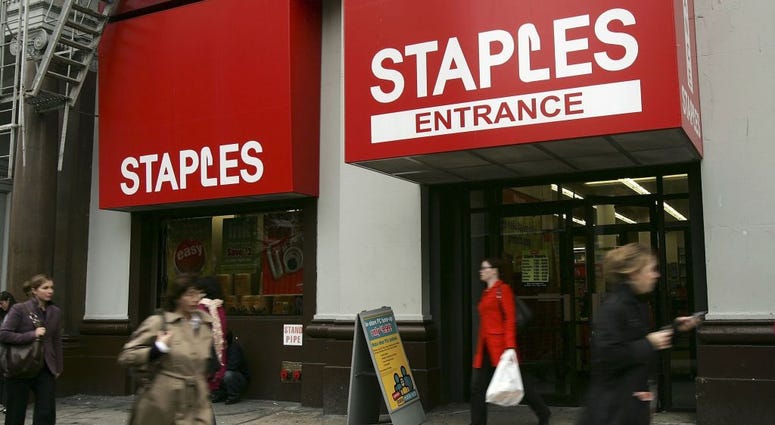 Pedestrians pass a Staples store November 14, 2006 in New York City. Staples
