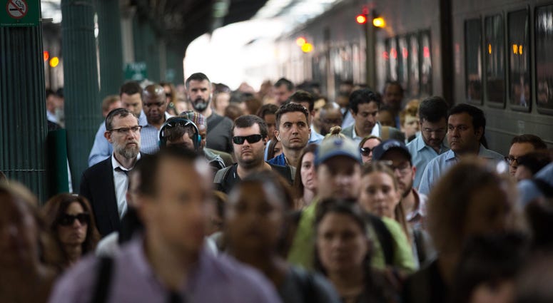 Passengers disembark from a New Jersey Transit train at Hoboken Terminal on July 10, 2017 in Hoboken, New Jersey. New Jersey Transit commuters