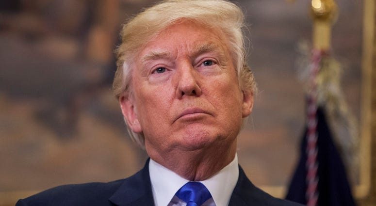 U.S. President Donald Trump attends the announcement of the introduction of the Reforming American Immigration for a Strong Economy (RAISE) Act in the Roosevelt Room at the White House on August 2, 2017 in Washington, DC. Donald Trump