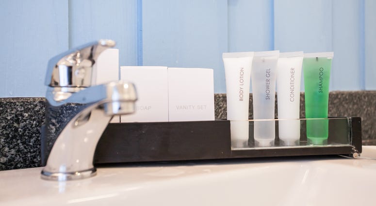 Plastic bottles in a hotel bathroom Hotel Plastic Bottles