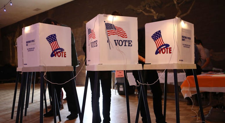 Voters cast their ballots at a Masonic Lodge on June 5, 2018 in Los Angeles, California. Election Day
