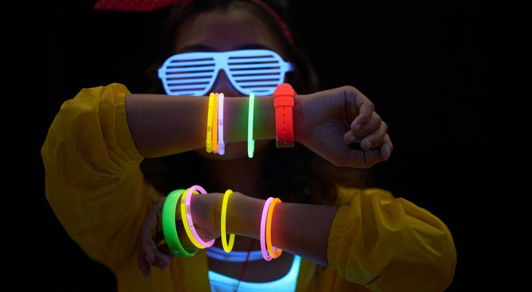 Woman participates in a 90s-themed party. 90s Party