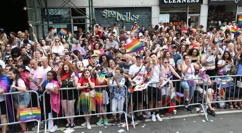 Crowd of parade goers at amfAR Celebrates NYC Pride 2018 on June 24, 2018 in New York City. Pride March 2018