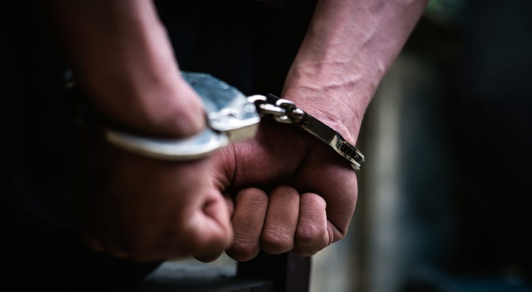 Handcuffed man Handcuffed man